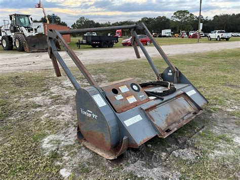 hydro ax skid steer trees|Loftness Timber Ax Hydraulic Skid.